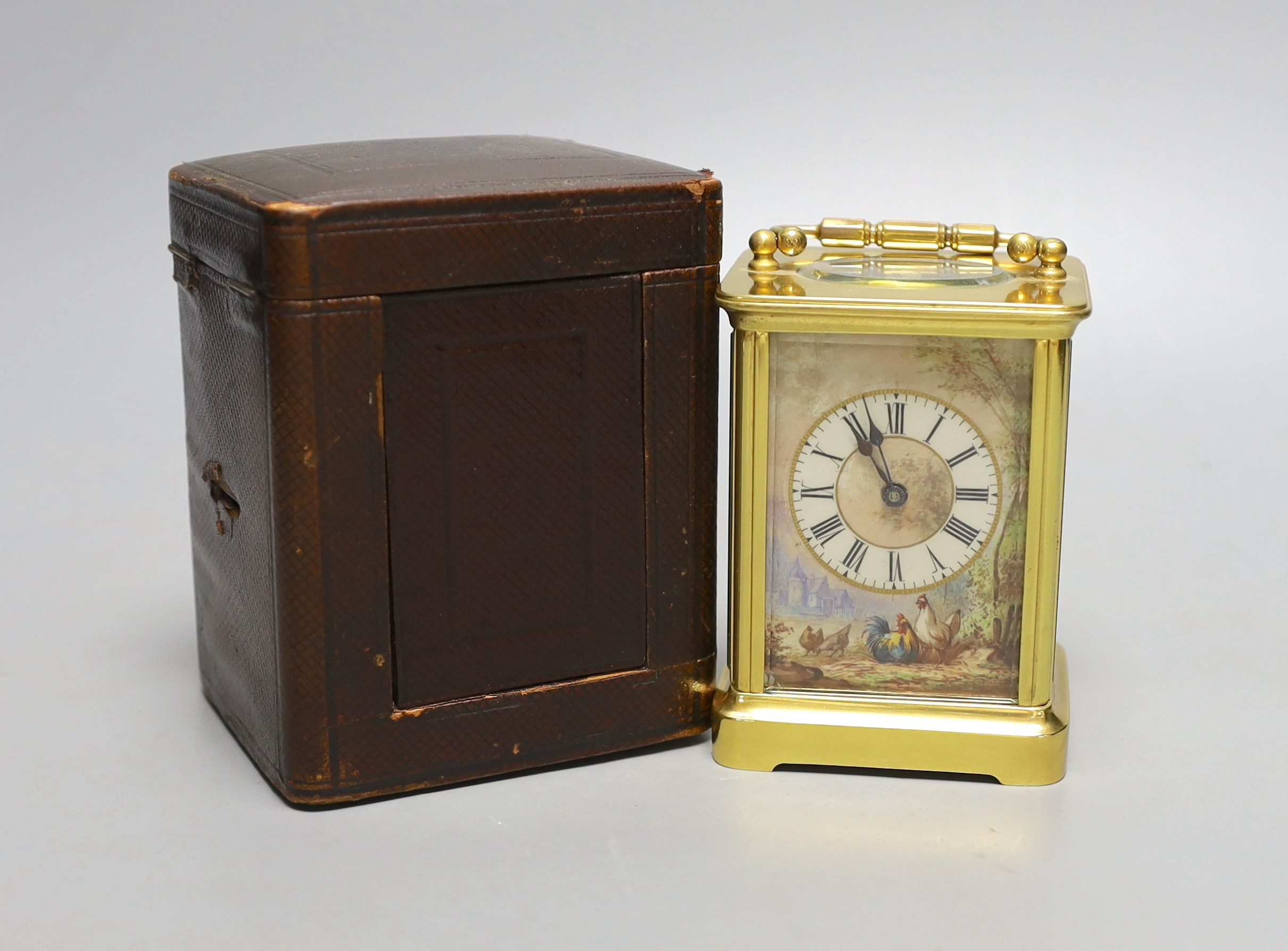 A cased late 19th century French gilt brass carriage timepiece with pastoral scene enamelled dial - 13cm talk